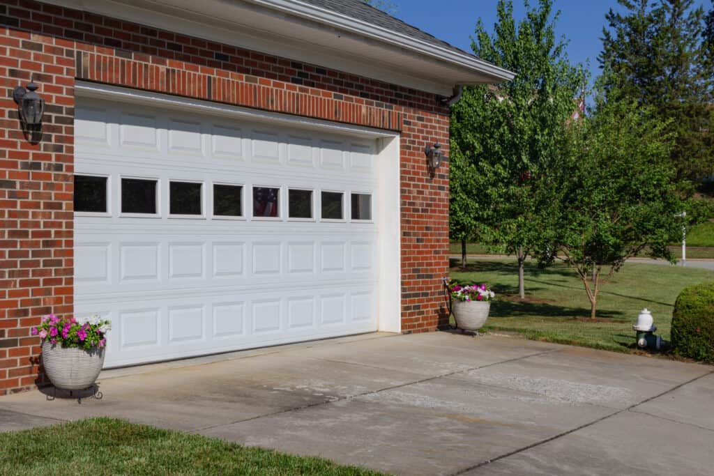Traditional 4 section garage door with windows